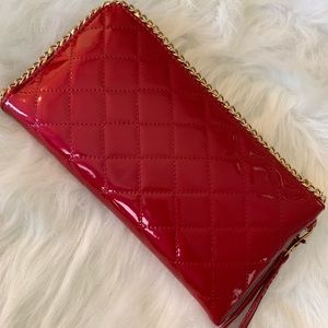 NEW 9’ Cherry clutch w/ detachable strap